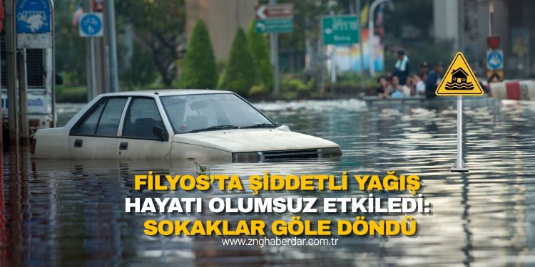 FİLYOS’TA ŞİDDETLİ YAĞIŞ HAYATI OLUMSUZ ETKİLEDİ: SOKAKLAR GÖLE DÖNDÜ